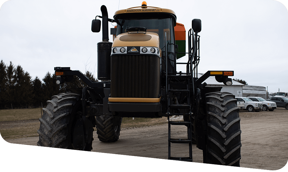 Yellow tractor on Harriston Agromart land